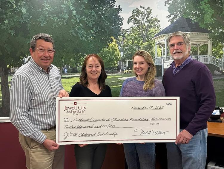 Pictured are Jewett City Savings Bank's Michael Alberts, President and CEO, and Diana Rose, Executive Vice President, Corporate Secretary, and Chief Administrative Officer, presenting a check to Northeast Connecticut Education Foundation's Sarah Wolfburg, Coordinator, and Joseph Adiletta