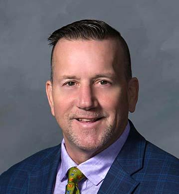 Headshot of Gene Michael Deary